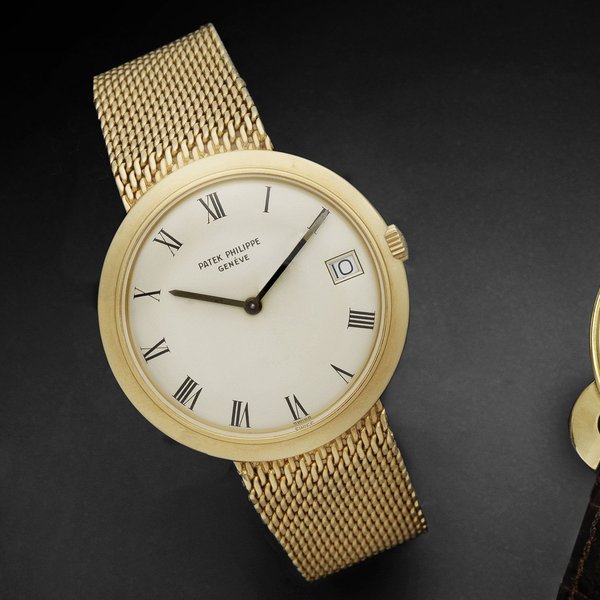 Patek Philippe. An 18ct gold automatic calendar bracelet watch Ref:3565/1, Case No.2696039, Movement No.1118187, Made 1970, Sold 26th January 1971
