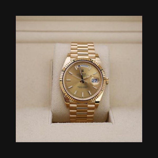 Rolex Rolex Day-Date40mm Fluted Bezel Champagne Index Dial Presidential Bracelet 228238