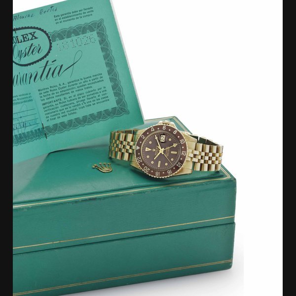 Rolex Rolex. A Fine and Attractive 18k Gold Automatic Dual Time Wristwatch with Center Seconds, Date and Bracelet SIGNED ROLEX, OYSTER PERPETUAL, GMT-MASTER, REF. 1675, CASE NO. 1'810'261, CIRCA 1968 · 1675