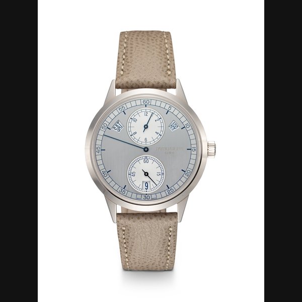 PATEK PHILIPPE, REF. 5235G-001, A FINE WHITE GOLD ANNUAL CALENDAR WRISTWATCH WITH REGULATOR-STYLE DISPLAY CASE NUMBER: 6'039'376, MOVEMENT NUMBER: 5’850’577