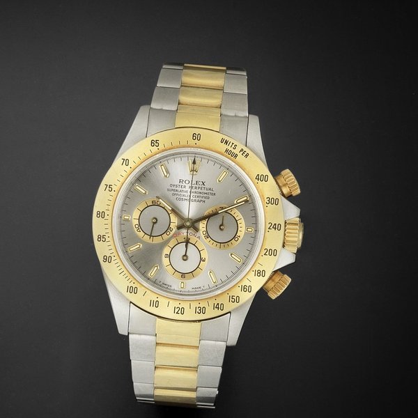 Rolex Rolex. A stainless steel and gold automatic chronograph bracelet watch Cosmograph Daytona, Ref:16523, Serial No.E49****, Movement No.342**, Circa 1990 · 16523