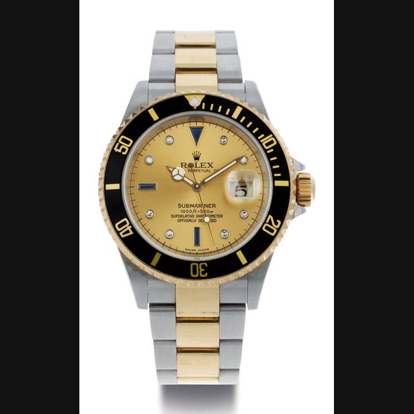 ROLEX. A STAINLESS STEEL, 18K GOLD SAPPHIRE AND DIAMOND-SET AUTOMATIC WRISTWATCH WITH CENTER SECONDS, DATE AND BRACELET SIGNED ROLEX, OYSTER PERPETUAL DATE, SUBMARINER, 1000FT=300M, CASE NO. Y933868, REF. 16613, CIRCA 2002