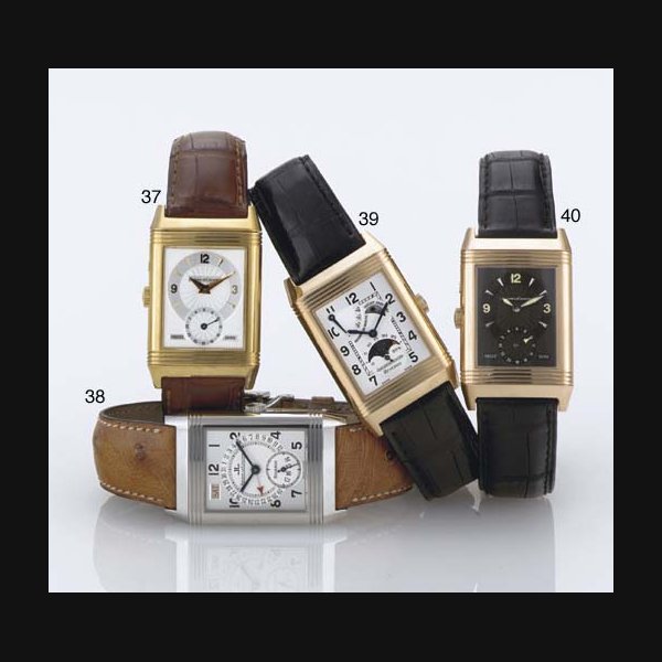 JAEGER-LECOULTRE. AN 18K GOLD RECTANGULAR REVERSIBLE DOUBLE-DIALED WRISTWATCH SIGNED JAEGER-LECOULTRE, "REVERSO DUOFACE DAY-NIGHT", CASE NO. 1827374, CIRCA 1995