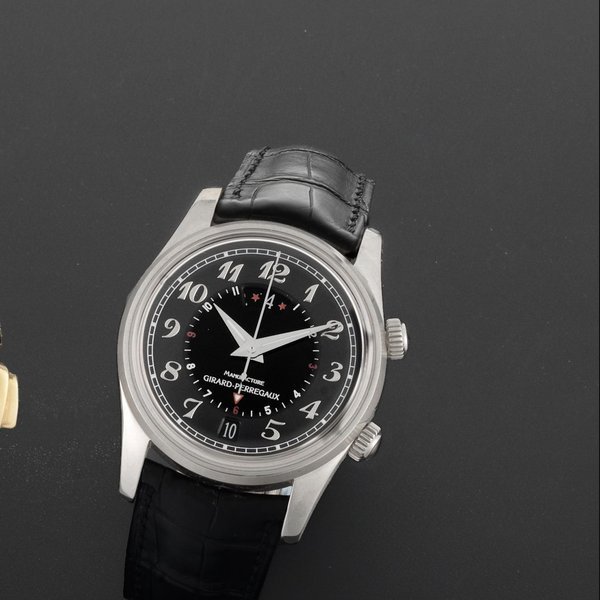 Girard-Perregaux Girard-Perregaux. An 18ct white gold automatic calendar alarm wristwatch Traveller II, Ref:4940, Case No.58, Circa 2002 · 4940