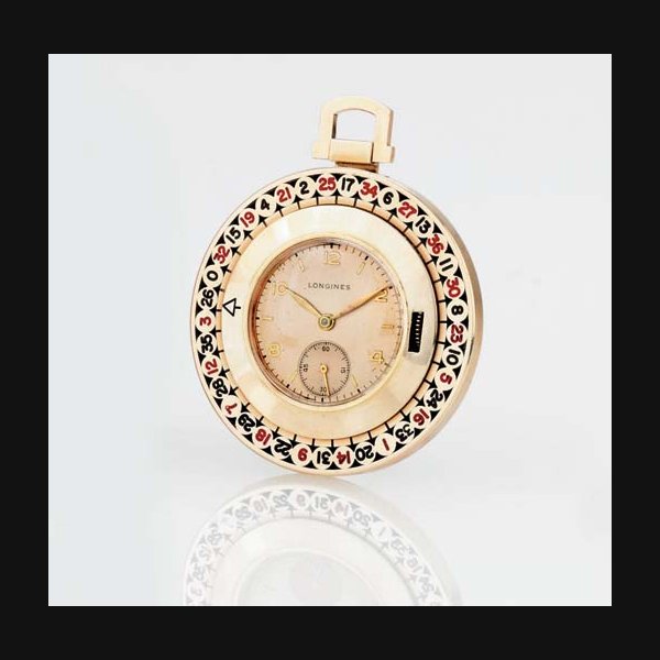 LONGINES. AN UNUSUAL 14K GOLD OPENFACE KEYLESS LEVER DRESS WATCH WITH REVOLVING ROULETTE WHEEL BEZEL SIGNED LONGINES, MOVEMENT NO. 7113678, CIRCA 1940