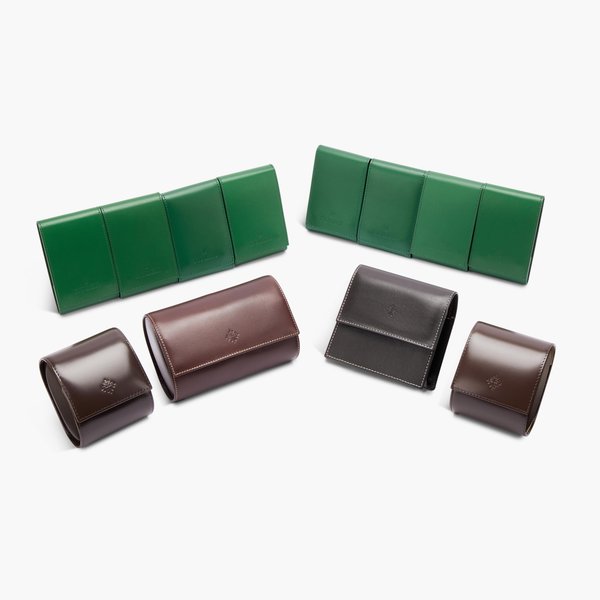 Patek Philippe A set of four Patek Philippe leather pouches and eight Rolex leather pouches, Circa 2020