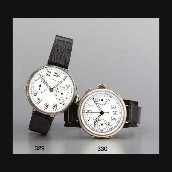 Swiss. An oversized silver hinged single-button chronograph wristwatch with enamel dial UNSIGNED, CIRCA 1920