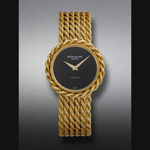 PATEK PHILIPPE, THE ONLY KNOWN YELLOW GOLD WRISTWATCH WITH ONYX DIAL, RETAILED BY GUBELIN, REF. 4282-1