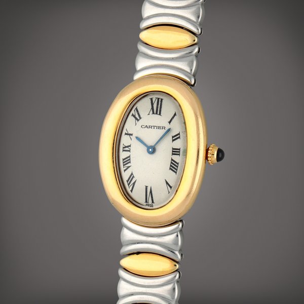 Cartier Baignoire | A yellow gold and stainless steel wristwatch | Circa 1995