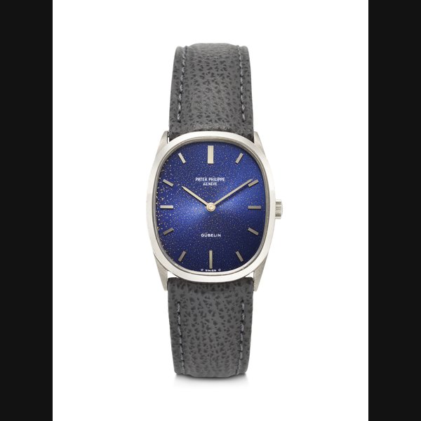 PATEK PHILIPPE, RETAILED BY GÜBELIN, VERY ATTRACTIVE WHITE GOLD 'ELLIPSE' WITH BLUE TROPICAL DIAL, REF. 3546