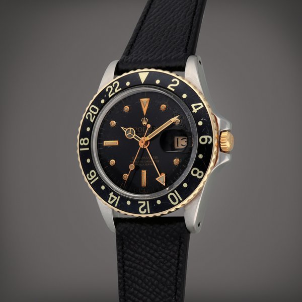 Rolex GMT-Master 'Nipple Dial', Reference 1675 | A stainless steel and yellow gold dual time zone wristwatch with date | Circa 1978 · 1675