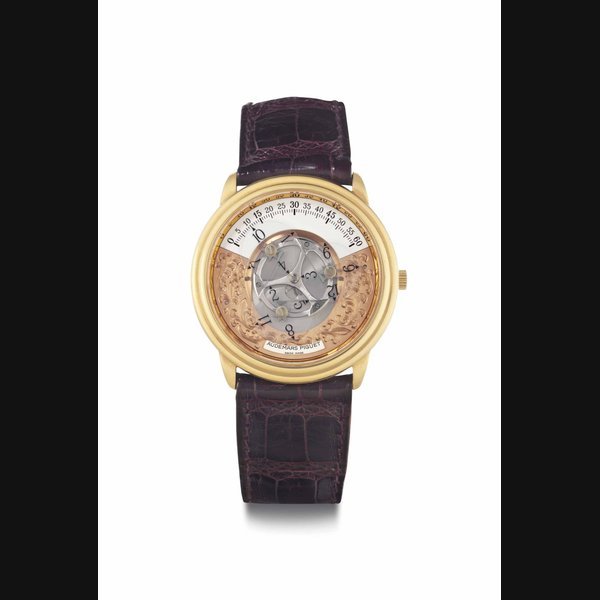 Audemars Piguet Audemars Piguet. An 18k Pink Gold Automatic Wandering Hour Wristwatch SIGNED AUDEMARS PIGUET, STAR WHEEL, NO. D20913, CIRCA 1990
