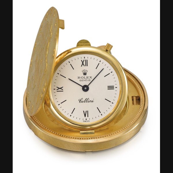 Rolex. A fine and rare 22K pink and 18K gold Twenty Dollar coin watch with an 18K gold pendant mount and chain Signed Rolex, Genève, Cellini model, ref. 3612/8, circa 2000