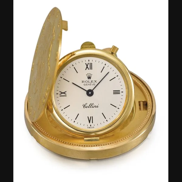 Rolex. A fine and rare 22K pink and 18K gold Twenty Dollar coin watch with an 18K gold pendant mount and chain Signed Rolex, Genève, Cellini model, ref. 3612/8, circa 2000