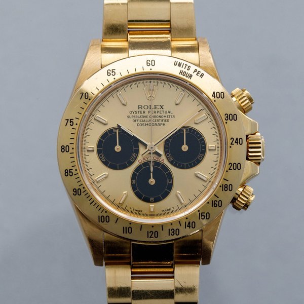 Rolex Rolex Cosmograph Daytona 16528 "PANDA FULL BLACK SUBDIALS" 18k YG with Original Certificate