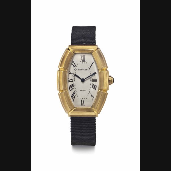 Cartier Cartier. A Lady's 18k Gold Tonneau-Shaped Wristwatch SIGNED CARTIER, PARIS, BAMBOO MODEL, CASE NO. A 111909, CIRCA 1995