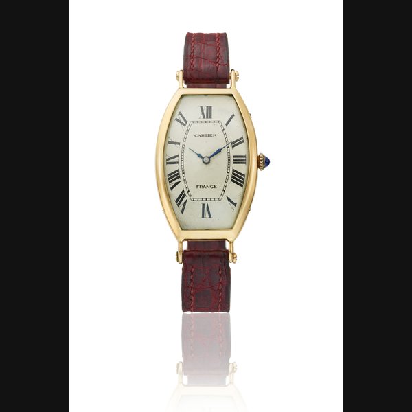 CARTIER, GOLD TONNEAU CINTRÉE WRISTWATCH MOVEMENT SIGNED EUROPEAN WATCH CO., NO. 12'631, CASE NOS. 4100, 21**7**