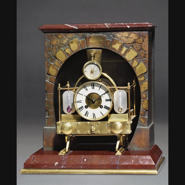  A French rouge griotte marble and patinated bronze eight day striking novelty compendium clock in the form of a locomotive CIRCA 1880