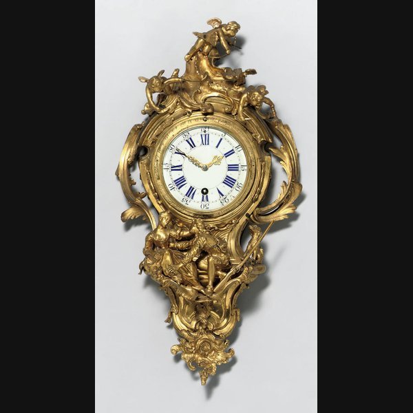  A Louis XV ormolu eight day timepiece cartel clock MID 18TH CENTURY