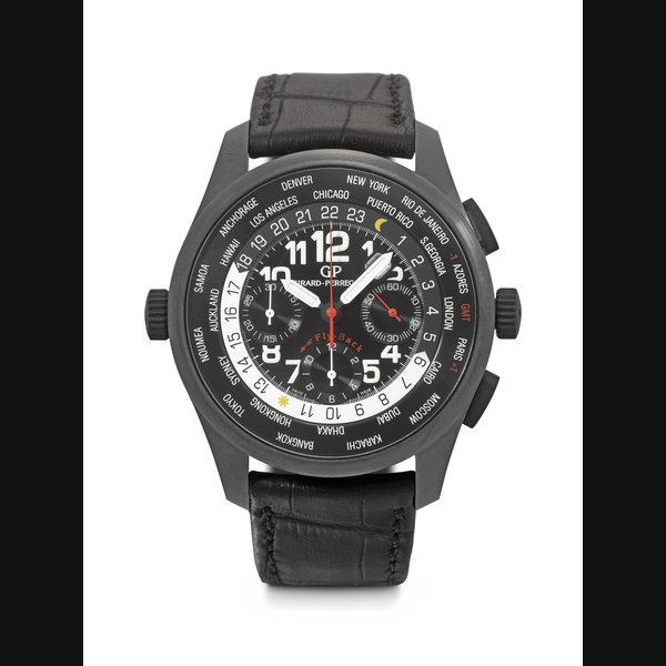 GIRARD-PERREGAUX. AN IMPORTANT CERAMIZED TITANIUM AUTOMATIC FLYBACK CHRONOGRAPH WORLD TIME WRISTWATCH WITH DATE, THE PROPERTY OF QUINCY JONES WORLD TIME CONTROL SHADOW MODEL, REF. 49820, CASE NO. 149, CIRCA 2011