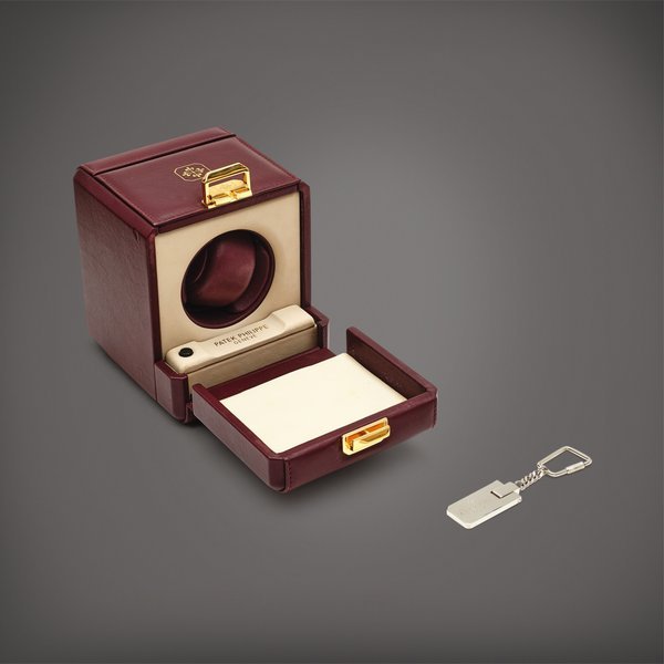 Patek Philippe A set of leather winding box and keychain, Circa 1990 | 百達翡麗 | 一套皮製自動上弦盒子及鑰匙扣，約1990年製