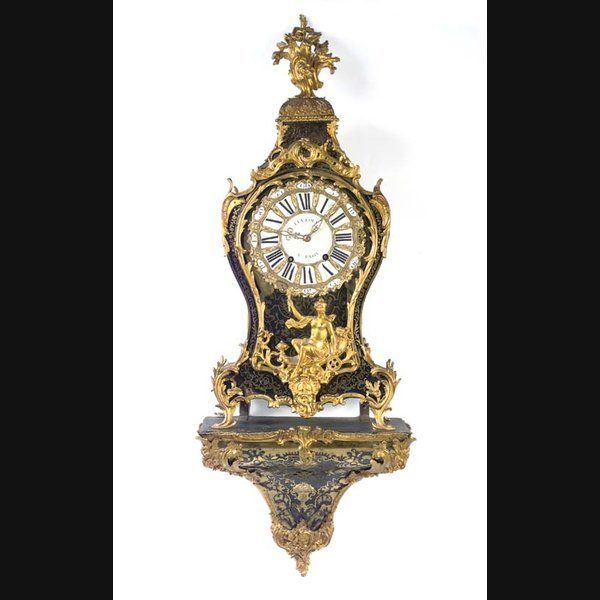 A French boulle tortoiseshell and ormolu-mounted striking bracket clock on wall bracket