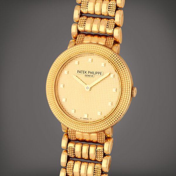 Patek Philippe Reference 4919/8J | A yellow gold bracelet watch | Circa 1999 · 4919/8J