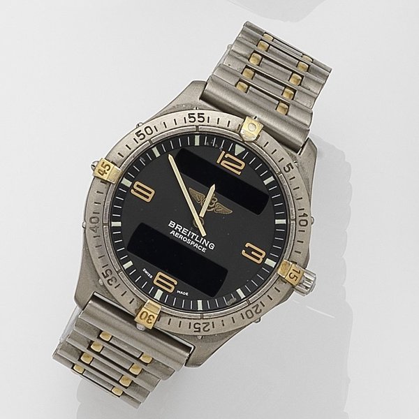 Breitling. A titanium and gold quartz wristwatch with digital display Aerospace, Ref:F56062, Case No.05280, Circa 2005