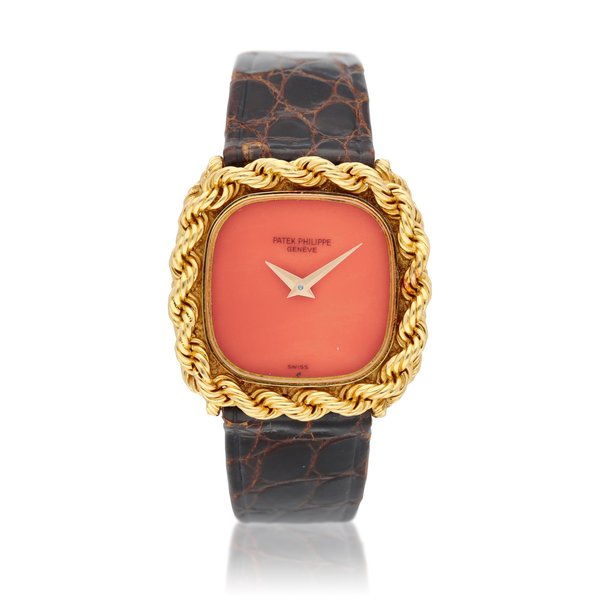Patek Philippe Reference 4444 An unusual manual winding 18k yellow gold wristwatch with a coral dial, circa 1975