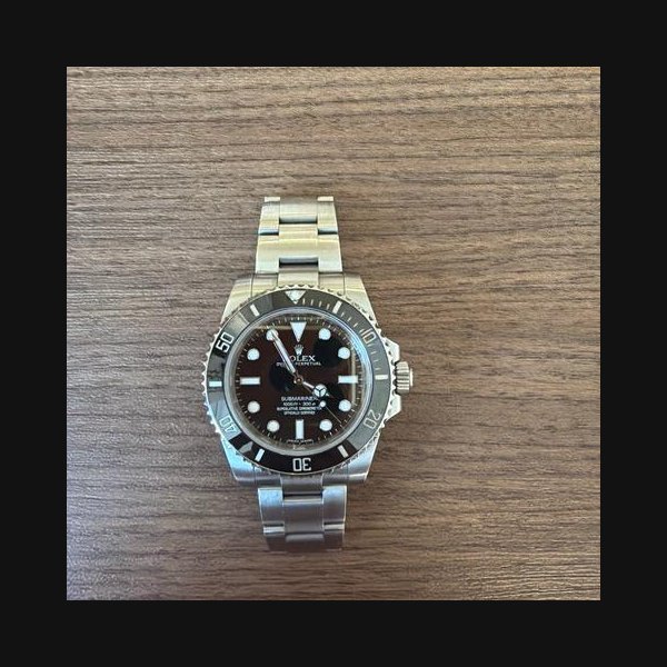 Rolex Rolex Submariner (No Date)Full set box and papers.