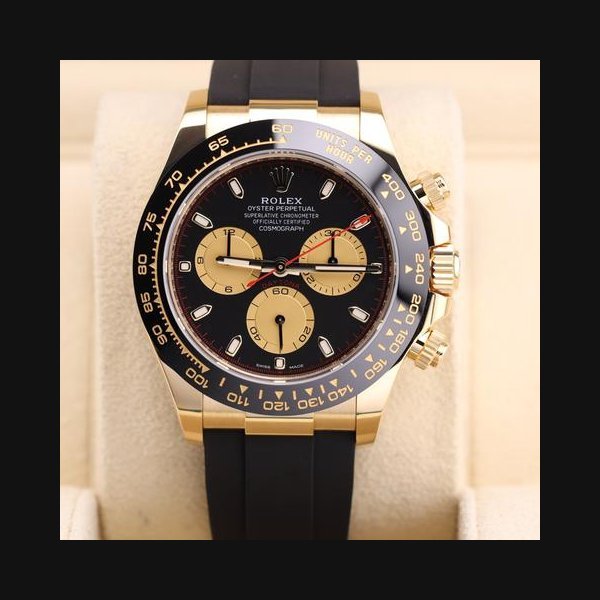 Rolex Rolex DaytonaPaul Newman Yellow Gold Black Dial Red Hand 116518LN Oysterflex 2022 Unworn Full Set