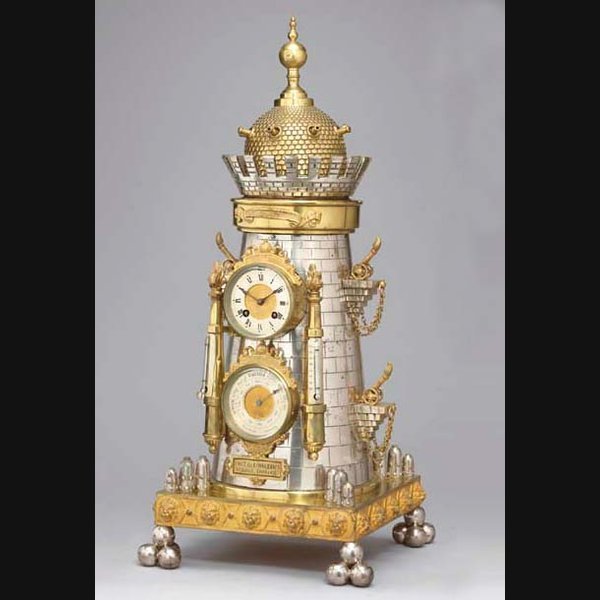 A rare French gilt and silvered brass automaton novelty clock CIRCA 1870