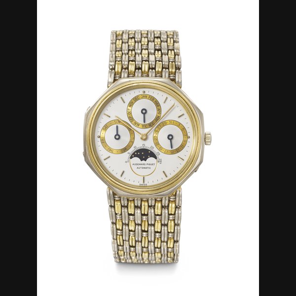 AUDEMARS PIGUET. A RARE 18K GOLD AND 18K WHITE GOLD AUTOMATIC PERPETUAL CALENDAR WRISTWATCH WITH MOON PHASES AND BRACELET QUANTIEME PERPETUEL MODEL, REF. 5557CA, CASE NO. B 72818, NO. 652, CIRCA 1982