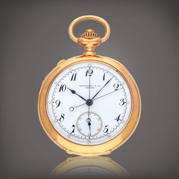 Patek Philippe Retailed By Spaulding & Co.: A yellow gold split chronograph open faced pocket watch | Circa 1900