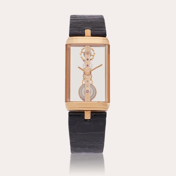 Corum Reference 13.150.55 Golden Bridge | A pink gold skeletonized wristwatch, Circa 1980