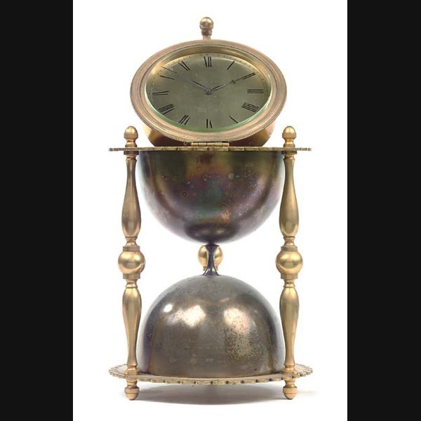 A French Gilt A French gilt, silvered and engraved brass novelty mantel timepiece, circa 1880