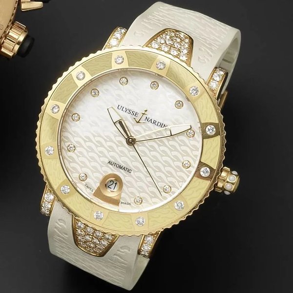 Ulysse Nardin Ulysse Nardin. A lady's 18ct gold, diamond set and mother of pearl automatic calendar wristwatch · 8106-101e-3c/13