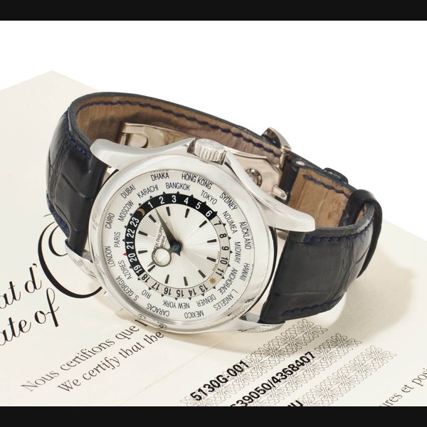 Patek Philippe. A Fine 18K White Gold Automatic World Time Wristwatch SIGNED PATEK PHILIPPE, GENEVE, REF. 5130, MOVEMENT NO. 3'639'050, CASE NO. 4'368'407, MANUFACTURED IN 2006