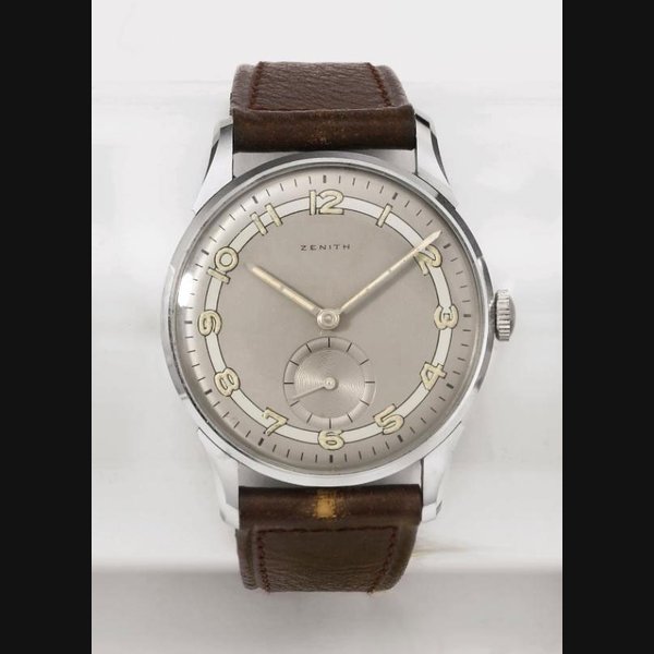 Zenith. An attractive stainless steel wristwatch with two-tone silvered dial, original sales tag and box SIGNED ZENITH, MOVEMENT NO. 3'464'392, CASE NO. 8'418'454, CIRCA 1945