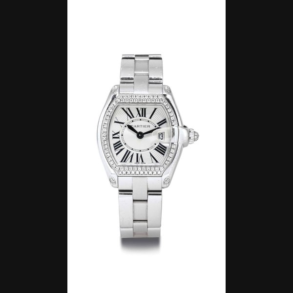 CARTIER. A LADY'S 18K WHITE GOLD AND DIAMOND TONNEAU WRISTWATCH WITH BRACELET SIGNED CARTIER, ROADSTER, CASE NOS. 76960CE AND 2723, CIRCA 2007