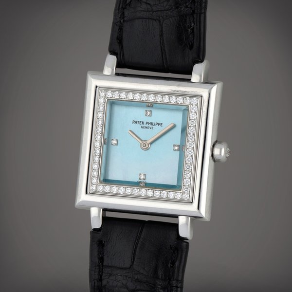 Patek Philippe Reference 4866/100 | A white gold and diamond-set wristwatch with blue mother-of-pearl dial | Circa 2000