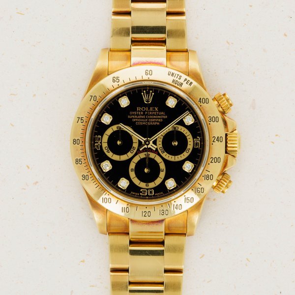 Rolex Rolex Daytona 16528 18k YG Black Diamond Dial