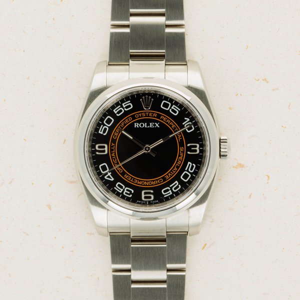 Rolex Oyster Perpetual Date 116000 Black and Orange Arabic Dial
