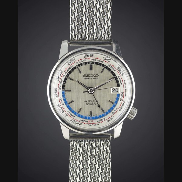 Seiko A GENTLEMAN'S STAINLESS STEEL SEIKO WORLD TIME AUTOMATIC BRACELET WATCH CIRCA 1964, REF. 6217-7000 · 6217-7000