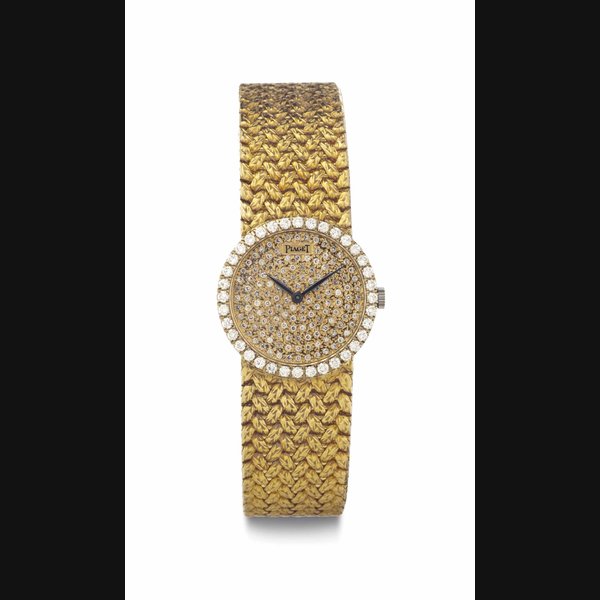 Piaget. A Lady's 18k Gold and Diamond-Set Bracelet Wristwatch SIGNED PIAGET, NO. 9706D2, NO. 278'063, MANUFACTURED IN 1976