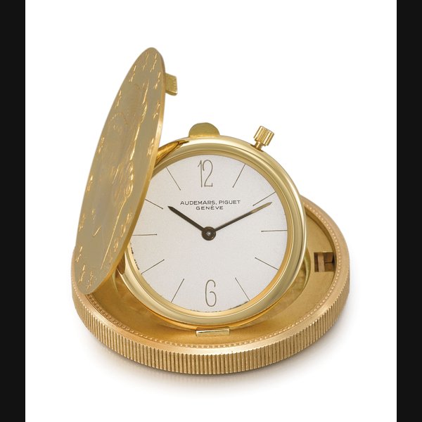 AUDEMARS PIGUET. A VERY FINE 18K GOLD TWENTY DOLLAR COIN WATCH Signed Audemars Piguet, Genève, ref. 5610BA, movement no. 78’095, case no. 19’225, circa 1960