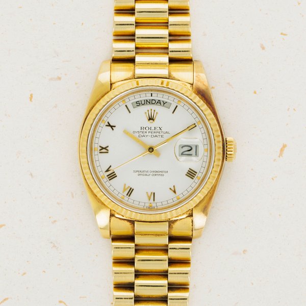 Rolex Rolex Day-Date 18038 White Small Roman Dial 18k YG , Price & Market Data