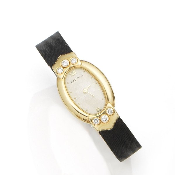 Cartier. A lady's 18K gold and diamond set quartz wristwatch Ref:1960, Case No.GC15161, Sold 14th October 1995