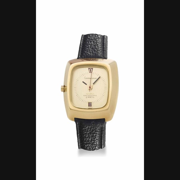 Omega. An unusual and large 18K gold rectangular-shaped wristwatch with sweep centre seconds and date SIGNED OMEGA, CONSTELLATION, ELECTROQUARTZ, F8192HZ, CIRCA 1970