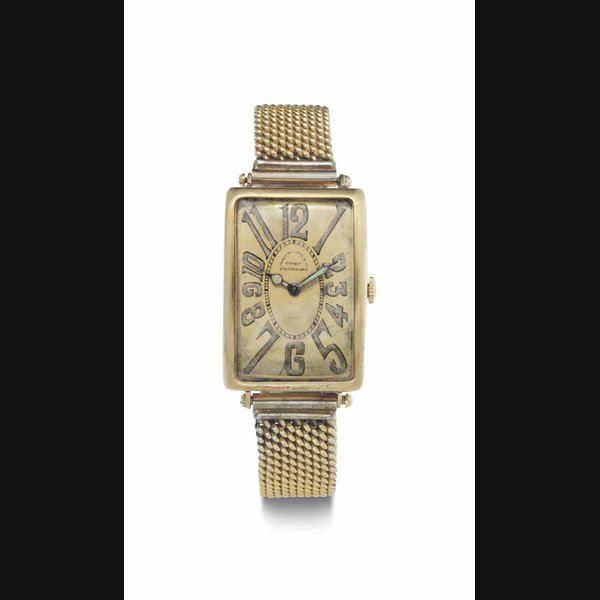 Patek Philippe. A Rare and Early 18k Gold Oversized Rectangular Hinged Wristwatch SIGNED PATEK PHILIPPE & CO., GENEVA, SWITZERLAND, RETAILED BY SPAULDING & CO., CHICAGO, REF. 11, MOVEMENT NO. 183'706, CASE NO. 284'461, MANUFACTURED IN 1914